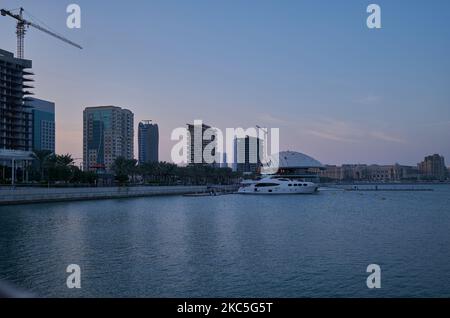 Lusail marina in Lusail city, Qatar sunset view showing the Arabic gulf , yacht and  skyscrapers in background. Construction industry Stock Photo