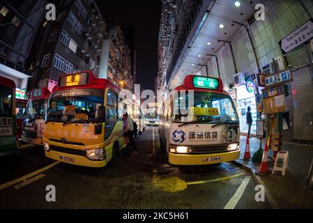 Red minibuses in Mongkok, in Hong Kong, China, on December 9, 2020. (Photo by Marc Fernandes/NurPhoto) Stock Photo