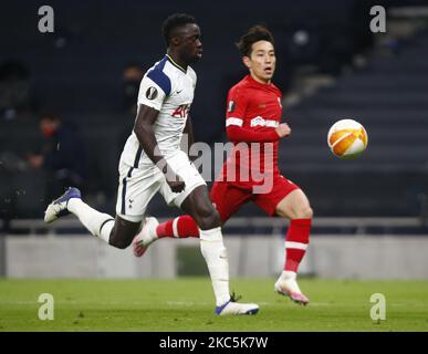 L-R Tottenham Hotspur's Davinson Sanchez and Koji Miyoshi of Royal Antwerp FC during UEFA Europe League Group J between Tottenham Hotspur and Royal Antwerp at Tottenham Hotspur stadium , London, England on 10th December 2020 (Photo by Action Foto Sport/NurPhoto) Stock Photo