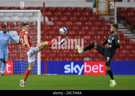 Ryan Yates of Nottingham Forest battles with Emiliano Marcondes of Brentford during the Sky Bet Championship match between Nottingham Forest and Brentford at the City Ground, Nottingham on Saturday 12th December 2020. (Photo by Jon Hobley/MI News/NurPhoto) Stock Photo