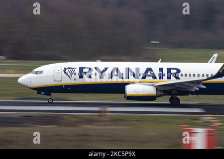 Panning image with blurry background of a Boeing 737-800 accelerating for departure. Ryanair Irish low cost carrier Boeing 737 aircraft as seen departing from Eindhoven EIN EHEH Airport. The narrow body Boeing 737-800 or B737 NG has the registration EI-DYB and is powered by 2x CFMI jet engines. The Ireland based budget airline FR RYR Ryan Air was the largest European low-cost passenger carrier. The world passenger traffic declined during the coronavirus covid-19 pandemic era with the industry struggling to survive while passengers keep obligatory safety measures during the flights such as face Stock Photo