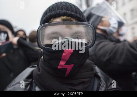 Protester seen during We Are Going For Freedom We Are Going For Everything protest organized by Womens Strike and Anti Lockdown Entrepreneurs against PIS government on the anniversary of the communist martial law outbreak in Warsaw on December 13, 2020. (Photo by Maciej Luczniewski/NurPhoto) Stock Photo