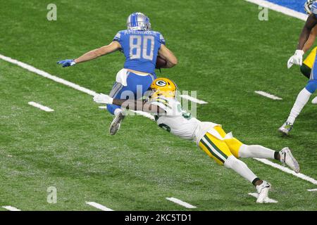 DETROIT, MI - OCTOBER 20: Detroit Lions RB Kerryon Johnson (33) readies  himself to stiff arm Minnesota Vikings S Anthony Harris (41) during NFL game  between Minnesota Vikings and Detroit Lions on