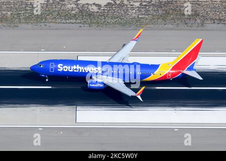 Southwest Airlines Boeing 737 aircraft landing at Los Angeles Airport runway. Airplane 737-800 of Southwest Airline. Plane N8540V. Stock Photo