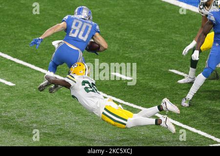 DETROIT, MI - OCTOBER 20: Detroit Lions RB Kerryon Johnson (33) readies  himself to stiff arm Minnesota Vikings S Anthony Harris (41) during NFL game  between Minnesota Vikings and Detroit Lions on