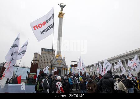 Ukrainian entrepreneurs and owners of small businesses attend a rally in Kyiv, Ukraine on 16 December 2020. Ukrainian small businessmen demanded the authorities cancel restrictive measures imposed due to the Covid-19 coronavirus epidemic and adopt bills on a simplified taxation system, as local media reported. (Photo by STR/NurPhoto) Stock Photo