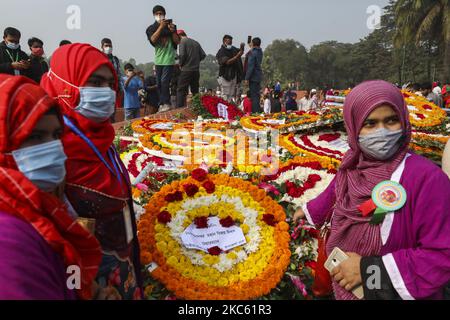 People gather to pay their respect at the national memorial of the 1971 Bangladesh independence war's martyrs to mark the country's Victory Day in Savar on December 16, 2020. Bangladesh celebrated its 50th victory day with due solemnity and rich tributes paid to the martyrs of the Liberation War of 1971. (Photo by Ahmed Salahuddin/NurPhoto) Stock Photo
