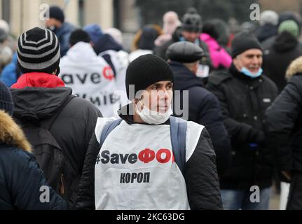 Ukrainian entrepreneurs and owners of small businesses attend a rally in Kyiv, Ukraine on 17 December 2020. Ukrainian small businessmen demanded the authorities cancel restrictive measures imposed due to the Covid-19 coronavirus epidemic and adopt bills on a simplified taxation system, as local media reported. (Photo by STR/NurPhoto) Stock Photo