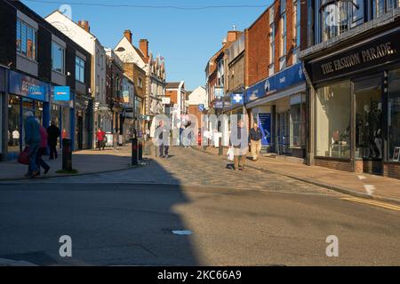 Shoppers on a high street Uttoxeter, Staffordshire, UK Stock Photo