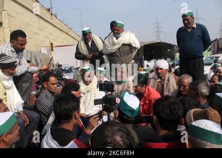 Farmers address media near Ghazipur protest site against the newly passed farm bills at Delhi-Uttar Pradesh border on the outskirts of New Delhi, India on December 26, 2020. Tens of thousands of farmers have been protesting at key entry points to the national capital for 31 days. (Photo by Mayank Makhija/NurPhoto) Stock Photo