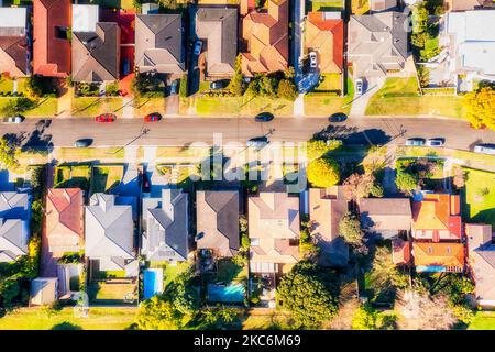 Local green residential suburbs in Sydney West - aerial top down view over quiet street with houses. Stock Photo