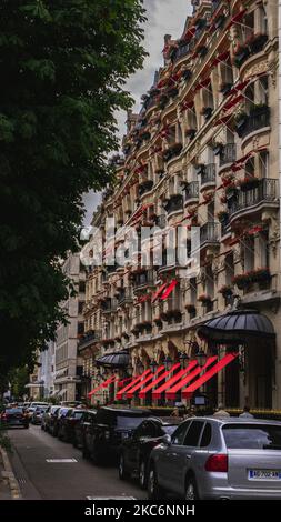 A side shot facade of the Plaza Athenee, a luxurious hotel in Paris, France Stock Photo