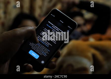 Whatsapp privacy policy terms message flashes on a mobile phone screen in Baramulla, Jammu and Kashmir India on 12 January 2021 (Photo by Nasir Kachroo/NurPhoto) Stock Photo
