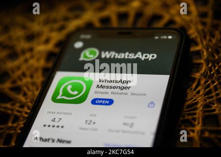 WhatsApp logo on the App Store is seen displayed on a phone screen in this illustration photo taken in Poland on January 14, 2021. Signal and Telegram messenger apps gained popularity due to the new WhatsApp's privacy policy. (Photo illustration by Jakub Porzycki/NurPhoto) Stock Photo