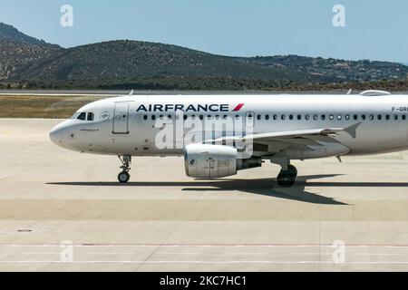 Air France Airbus A319 aircraft as seen taxiing in Athens International Airport ATH LGAV. The narrow body single-aisle airplane has the registration F-GRHT and is powered by 2x CFMI jet engines. AIRFRANCE is the French flag carrier, member of SkyTeam global aviation airline alliance, owned by Air France - KLM parent company with the main hub / base Paris CDG Charles de Gaulle Airport. The world passenger traffic declined during the coronavirus covid-19 pandemic era with the industry struggling to survive while passengers keep obligatory safety measures during the flights such as facemask, nega Stock Photo