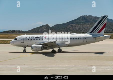 Air France Airbus A319 aircraft as seen taxiing in Athens International Airport ATH LGAV. The narrow body single-aisle airplane has the registration F-GRHT and is powered by 2x CFMI jet engines. AIRFRANCE is the French flag carrier, member of SkyTeam global aviation airline alliance, owned by Air France - KLM parent company with the main hub / base Paris CDG Charles de Gaulle Airport. The world passenger traffic declined during the coronavirus covid-19 pandemic era with the industry struggling to survive while passengers keep obligatory safety measures during the flights such as facemask, nega Stock Photo