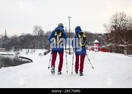 A couple doing Nordic walking in a snow in Krakow, Poland. January 17, 2021. (Photo by Beata Zawrzel/NurPhoto) Stock Photo