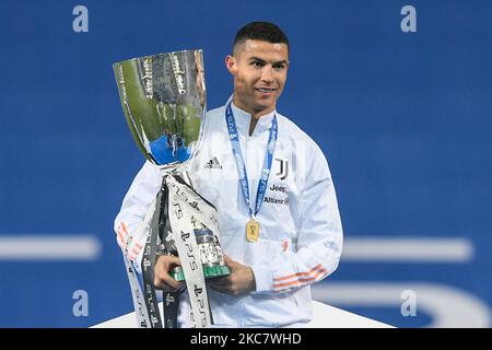 Cristiano Ronaldo of Juventus celebrates with the trophy the