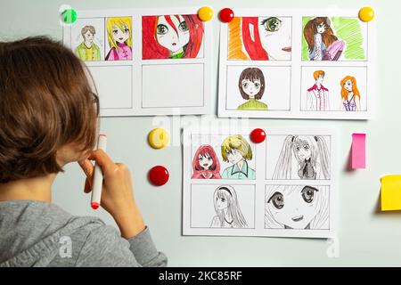 The Artist Draws Anime Comics On Paper Storyboard For The Cartoon The  Illustrator Creates Sketches For The Book Stock Photo - Download Image Now  - iStock