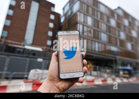 Logo of Twitter displayed on a mobile phone in front of Twitter new European Headquarters in Dublin. On Friday, 29 January, 2021, in Dublin, Ireland. (Photo by Artur Widak/NurPhoto) Stock Photo