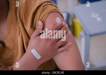 A total of 35 from 566,000 health workers in Indonesia underwent Covid-19 vaccination at the Udayana University Hospital, Bali on January 14, 2021. Currently, Indonesia has had 18 million doses of Sinovac vaccine received in stages: 1.2 million doses on December 6 2020, 1.8 million doses on December 31, 2020, and 15 million doses on January 12, 2021. (Photo by Keyza Widiatmika/NurPhoto) Stock Photo