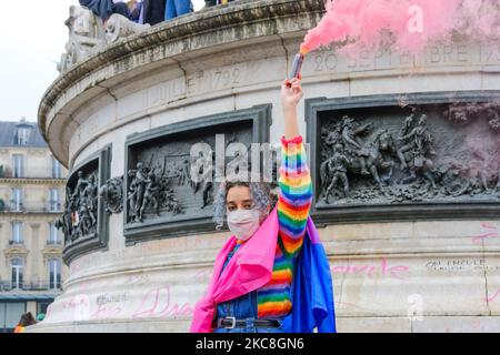 Demonstrator in front of the statue of Republic Square, Paris, France, on January 31, 2021 during a march against LGBTI phobias and for LGBTI rights. (Photo by Vincent Koebel/NurPhoto) Stock Photo