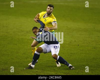 Kenneth Zohore of Millwall tussle with Norwich City's Grant Hanley during The Sky Bet Championship between Millwall and Norwich City at The Den Stadium, London on 2nd February, 2021 (Photo by Action Foto Sport/NurPhoto) Stock Photo