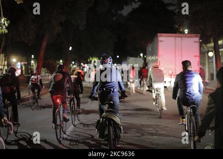 Cyclists ride during a protest called 'Revenge Friday' on February 12, 2020 in Mexico City, Mexico. A cycling protest called 'Friday of Revenge' was held after a group of cyclists was attacked by Mexico City police last Friday. (Photo by Guillermo GutiÃ©rrez/NurPhoto)