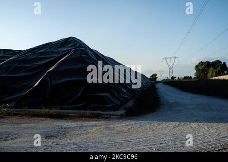 This photograph, taken on 15 August 2019, shows the 'Taverna del Ré' repository for Ecobale located between the border of Giugliano in Campania (Naples) and Villa Literno (Caserta) in the middle of the Lands of Fires 'Terra dei Fuochi'. It is one of the largest storage sites in Campania for its 130 hectares with about 6 million Ecobale inside. The 'Lands of Fires' is an area of the Campania region located between Naples and Caserta, reported as such by toxic waste fires and the ignition of waste fires that have had a strong impact on the health of the local population. The Public Prosecutor's  Stock Photo