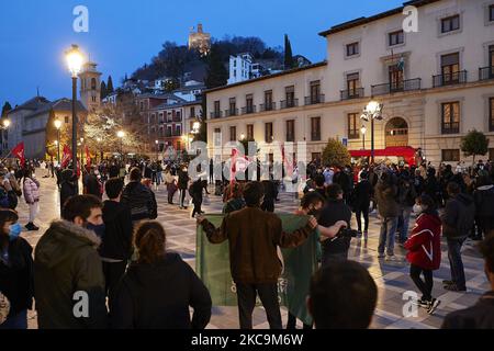 General view of Plaza Nueva square during a protest against violence and police repression after the altercations in Linares (Jaén) and against the imprisonment of singer Pablo Hasel on February 20, 2021 in Granada, Spain. Last February 12, two policemen unjustifiably assaulted a man and his 14-year-old daughter in Linares (Jaen) after an discussion, according to the judge. Same night, riots between the residents of the town and the police take place near the police station. The two policemen were arrested for abuse of superiority, risk of flight and destruction of evidence. Protests have been Stock Photo
