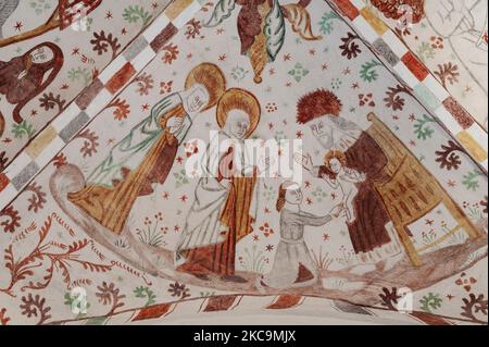 Circumcision of Jesus in the temple, a medieval fresco in Fanefjord church, Denmark, October 10, 2022 Stock Photo