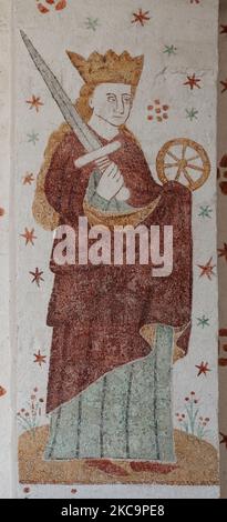 Mural depicting saint Catherine with sword and wheel, Fanefjord church, Denmark, October 10, 2022 Stock Photo