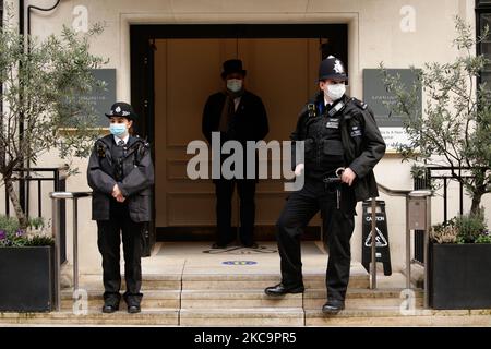 Police officers guard the King Edward VII Hospital, where Britain's 99-year-old Prince Philip, the Duke of Edinburgh, continues to receive medical care in London, England, on February 21, 2021. Prince Philip, husband of Queen Elizabeth II, was admitted to the hospital on Tuesday after reporting feeling unwell. (Photo by David Cliff/NurPhoto) Stock Photo