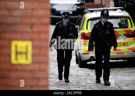 Police officers guard the King Edward VII Hospital, where Britain's 99-year-old Prince Philip, the Duke of Edinburgh, continues to receive medical care in London, England, on February 21, 2021. Prince Philip, husband of Queen Elizabeth II, was admitted to the hospital on Tuesday after reporting feeling unwell. (Photo by David Cliff/NurPhoto) Stock Photo