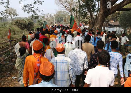 BJP supporter arrive at the Public Meeting at Chuchura Dunlop play ground ahead of the upcoming West Bengal legislative assembly election , In Hooghly district ,West Bengal,India on February 22,2021. (Photo by Debajyoti Chakraborty/NurPhoto) Stock Photo