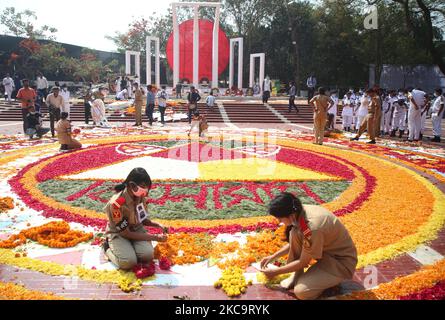 Bangladesh is observing International Mother Language Day with tributes to the heroes who sacrificed their lives for the Bangla language in 1952, in Dhaka, Bangladesh, on February 22, 2021. People from all walks of life paid homage to the language martyrs at the Central Shaheed Minar in Dhaka amid the coronavirus pandemic. (Photo by Sony Ramany/NurPhoto) Stock Photo