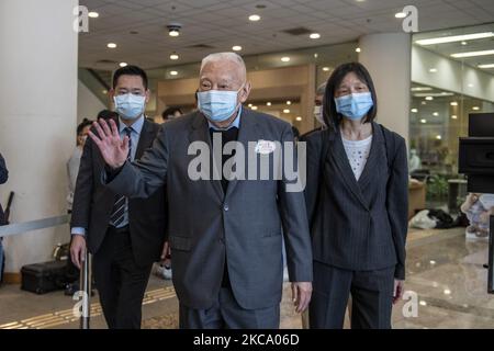 Former Hong Kong Chief Executive, Tung Chee-hwa, waves to photographers at a covid-19 vaccination centre, in Hong Kong, Friday, Feb 26, 2021, Hong Kong starts its covid-19 vaccination program today. (Photo by Vernon Yuen/NurPhoto) Stock Photo