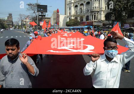 Supporters walks to attend a joint mass meeting in a mega rally ahead of the 2021 state legislative assembly elections in Kolkata , India on Sunday, 28th February ,2021. Thousands of activists gathered at Brigade Parade Ground in Kolkata. (Photo by Sonali Pal Chaudhury/NurPhoto) Stock Photo