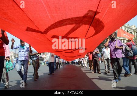 Supporters walks to attend a joint mass meeting in a mega rally ahead of the 2021 state legislative assembly elections in Kolkata , India on Sunday, 28th February ,2021. Thousands of activists gathered at Brigade Parade Ground in Kolkata. (Photo by Sonali Pal Chaudhury/NurPhoto) Stock Photo