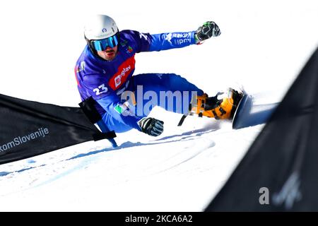 Coratti Edwin from Italy competes in the Men's Parallel Giant Slalom Finals during the FIS Snowboard World Championships 2021 on March 01, 2021 on Rogla, Slovenia. (Photo by Damjan Zibert/NurPhoto) Stock Photo