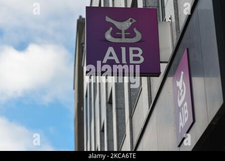 An AIB logo seen in Dublin city center during Level 5 COVID-19 lockdown. Bank of Ireland is due to close 103 branches across Island of Ireland as the acceleration in digital banking has now reached its 'critical point'. A total of 88 branches in the Republic of Ireland will close leaving 169, and 15 branches in Northern Ireland will close leaving 13. On Monday, March 1, 2021, in Dublin, Ireland. (Photo by Artur Widak/NurPhoto) Stock Photo