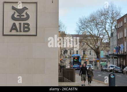 An AIB logo seen in Dublin city center during Level 5 COVID-19 lockdown. Bank of Ireland is due to close 103 branches across Island of Ireland as the acceleration in digital banking has now reached its 'critical point'. A total of 88 branches in the Republic of Ireland will close leaving 169, and 15 branches in Northern Ireland will close leaving 13. On Monday, March 1, 2021, in Dublin, Ireland. (Photo by Artur Widak/NurPhoto) Stock Photo