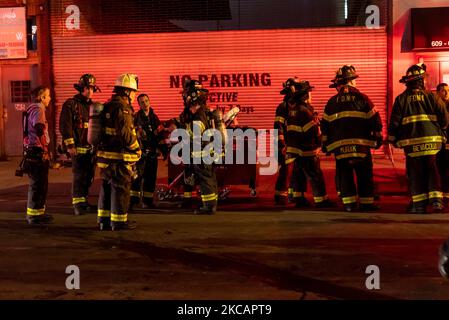 FDNY personnel are seen at a auto shop fire in Midtown, Manhattan, New ...
