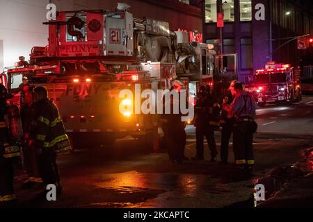 FDNY personnel are seen at a auto shop fire in Midtown, Manhattan, New ...