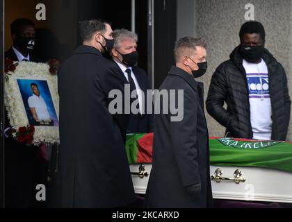 The coffin of George Nkencho, a 27-year-old man was shot dead by Gardai outside his Dublin home last December, is taken from the Sacred Heart of Jesus Church in Huntstown, Dublin, following his funeral mass. On Saturday, March 13, 2021, in Dublin, Ireland. (Photo by Artur Widak/NurPhoto) Stock Photo