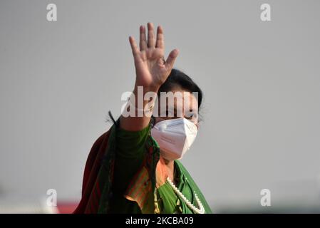 President Bidya Devi Bhandari along with face mask wave her hand before leave for two-day official state visit to Bangladesh on Monday, March 22, 2021 on invitation of her Bangladeshi counterpart Mohammad Abdul Hamid to attend the celebration of the birth centenary of Bangabandhu Sheikh Mujibur Rahman, the Father of the Nation of Bangladesh. (Photo by Narayan Maharjan/NurPhoto) Stock Photo