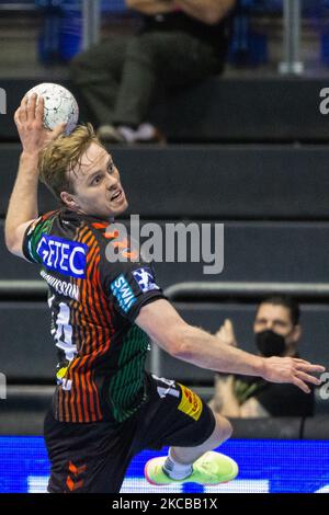 Omar Ingi Magnusson of SC Magdeburg controls the ball during the LIQUI MOLY Handball-Bundesliga match between SC Magdeburg and Fuechse Berlin at GETEC-Arena on March 21, 2021 in Magdeburg, Germany. (Photo by Peter Niedung/NurPhoto) Stock Photo