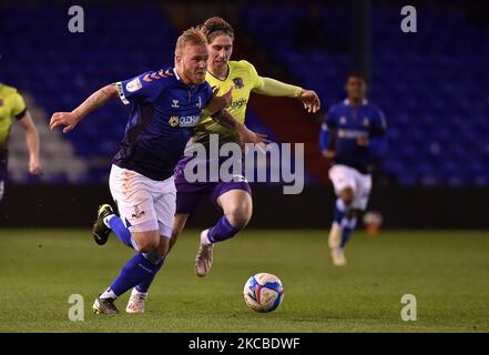 Oldham Athletic's Marcel Hilssner tussles with Alex Hartridge of Exeter City during the Sky Bet League 2 match between Oldham Athletic and Exeter City at Boundary Park, Oldham on Tuesday 23rd March 2021. (Photo by Eddie Garvey/MI News/NurPhoto) Stock Photo