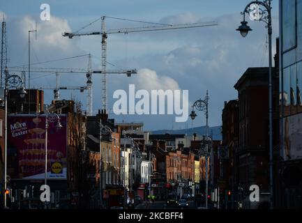 A view of construction cranes over Dublin during Level 5 Covid-19 lockdown.. On Thursday, March 25, 2021, in Dublin, Ireland. (Photo by Artur Widak/NurPhoto) Stock Photo