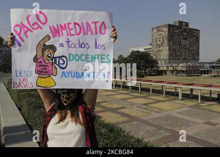 Students of the National Autonomous University of Mexico, held a demonstration outside the Rectory, Ciudad Universitaria, in response to complaints about the lack of payments or incomplete payments to professors and adjunct professors of this university, during the health emergency and the orange epidemiological traffic light in Mexico City. In the midst of the vaccination of older adults in Mexico against COVID-19, this Thursday, the country accumulated more than 200 thousand deaths due to coronavirus during the sanitary emergency. Health authorities expect a third wave of infections to occur Stock Photo